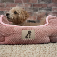 AllPetSolutions Alfie pink dog bed side profile with bolster sides