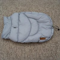 AllPetSolutions grey dog puffer jacket worn on a walk