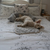 AllPetSolutions Alfie sofa dog bed with the sides folded up as a nest
