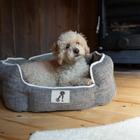 AllPetSolutions Alfie brown dog bed side profile with raised bolster sides