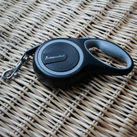 AllPetSolutions grey retractable lead shown from the side
