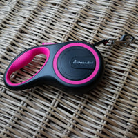 AllPetSolutions pink retractable lead shown from the side