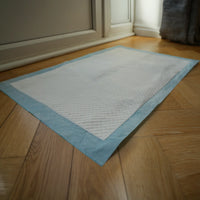 AllPetSolutions puppy pads shown in their packaging