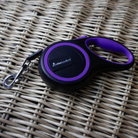AllPetSolutions purple retractable lead shown from the side
