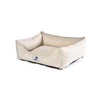 AllPetSolutions Dexter cream waterproof dog bed shown in a home setting