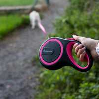 AllPetSolutions pink retractable lead brake and lock button detail