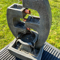 AllPetSolutions 5 tier water feature LED lights glowing at dusk
