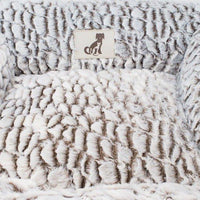 AllPetSolutions Alfie sofa dog bed with a dog lying on it