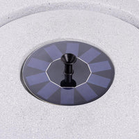 AllPetSolutions light grey bowl stone solar feature running in a garden