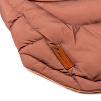 AllPetSolutions brown dog puffer jacket worn on a walk