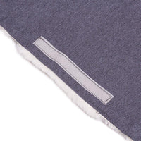 AllPetSolutions Grayson fleece topper fitted on a dog bed