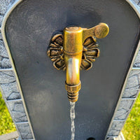AllPetSolutions marble look tap feature with water pouring from the spout