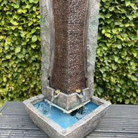 AllPetSolutions modern column feature with water sheeting down the column