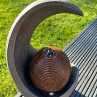 AllPetSolutions moonshape vase feature with water flowing into the bowl