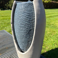 AllPetSolutions white and grey open vase feature with its solar panel