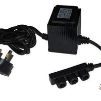 AllPetSolutions underwater rock lighting glowing in a pond at night