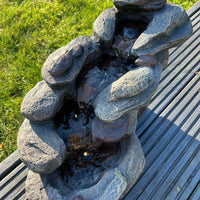 AllPetSolutions rock waterfall feature with water tumbling down the rocks