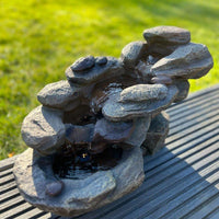 AllPetSolutions rock waterfall feature LED lit after dark